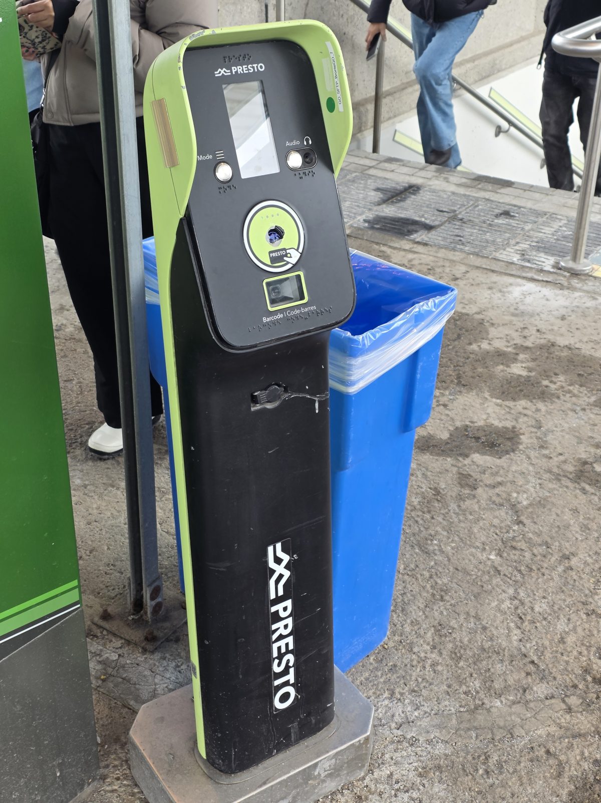 Presto card tap machine at bus stop