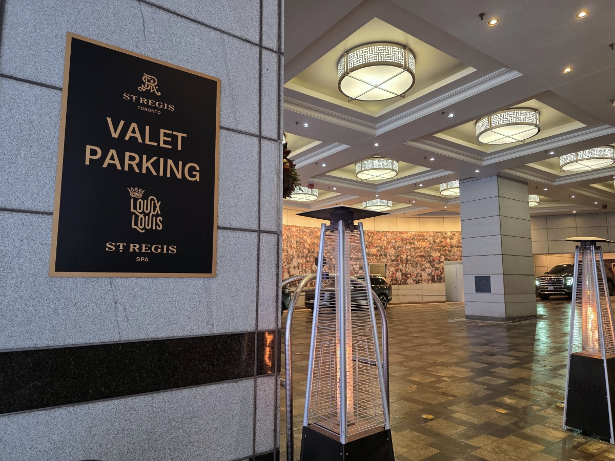 St. Regis Toronto valet parking sign at the hotel entrance