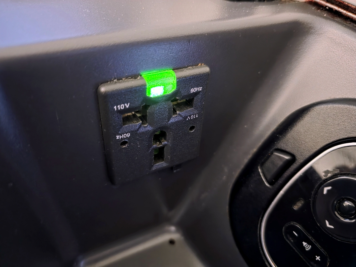 Air Canada 787 Business Class 110V power outlet and charging ports