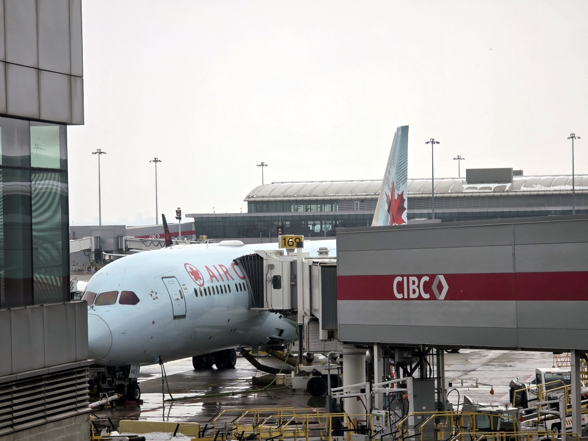 Air Canada aircraft seen from the Maple Leaf Lounge at Toronto Airport
