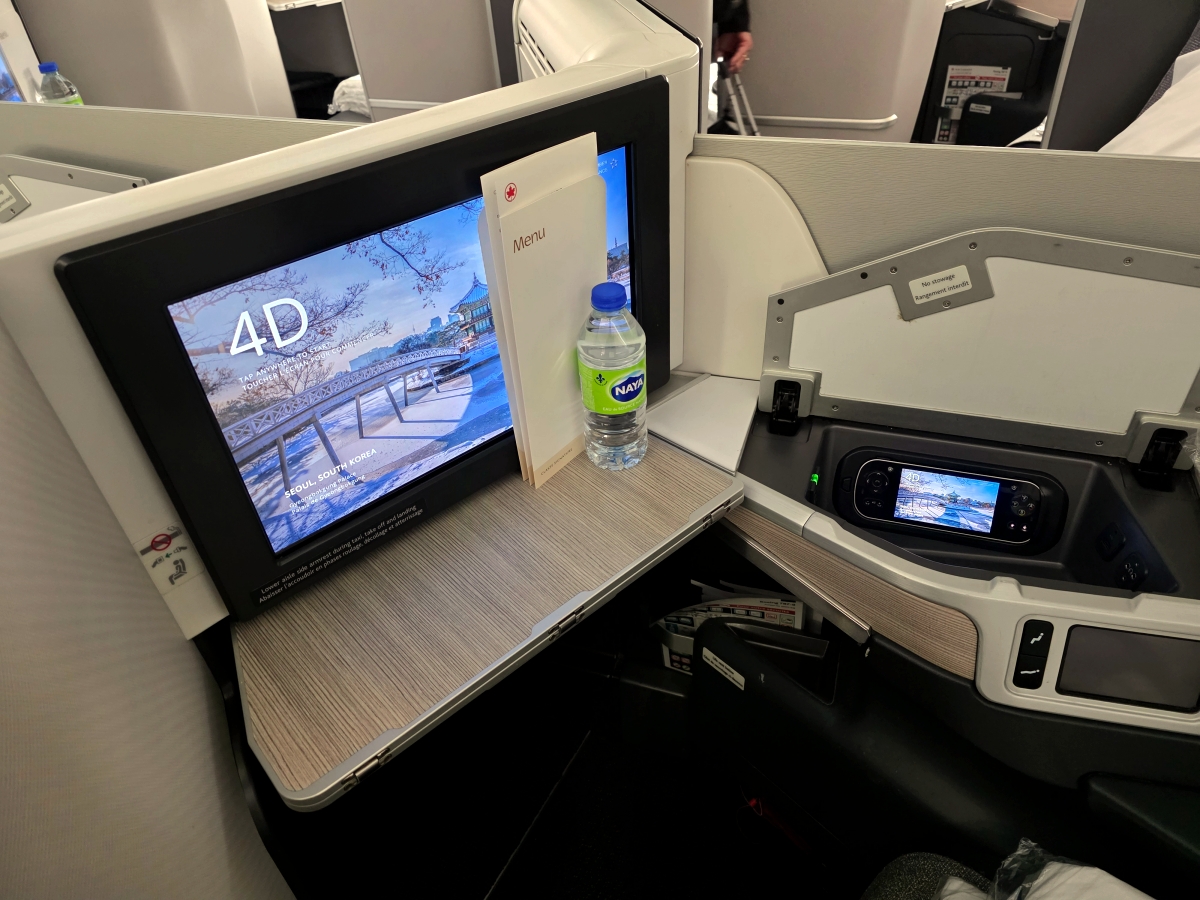 Air Canada 787 Business Class seat storage compartment and tray table