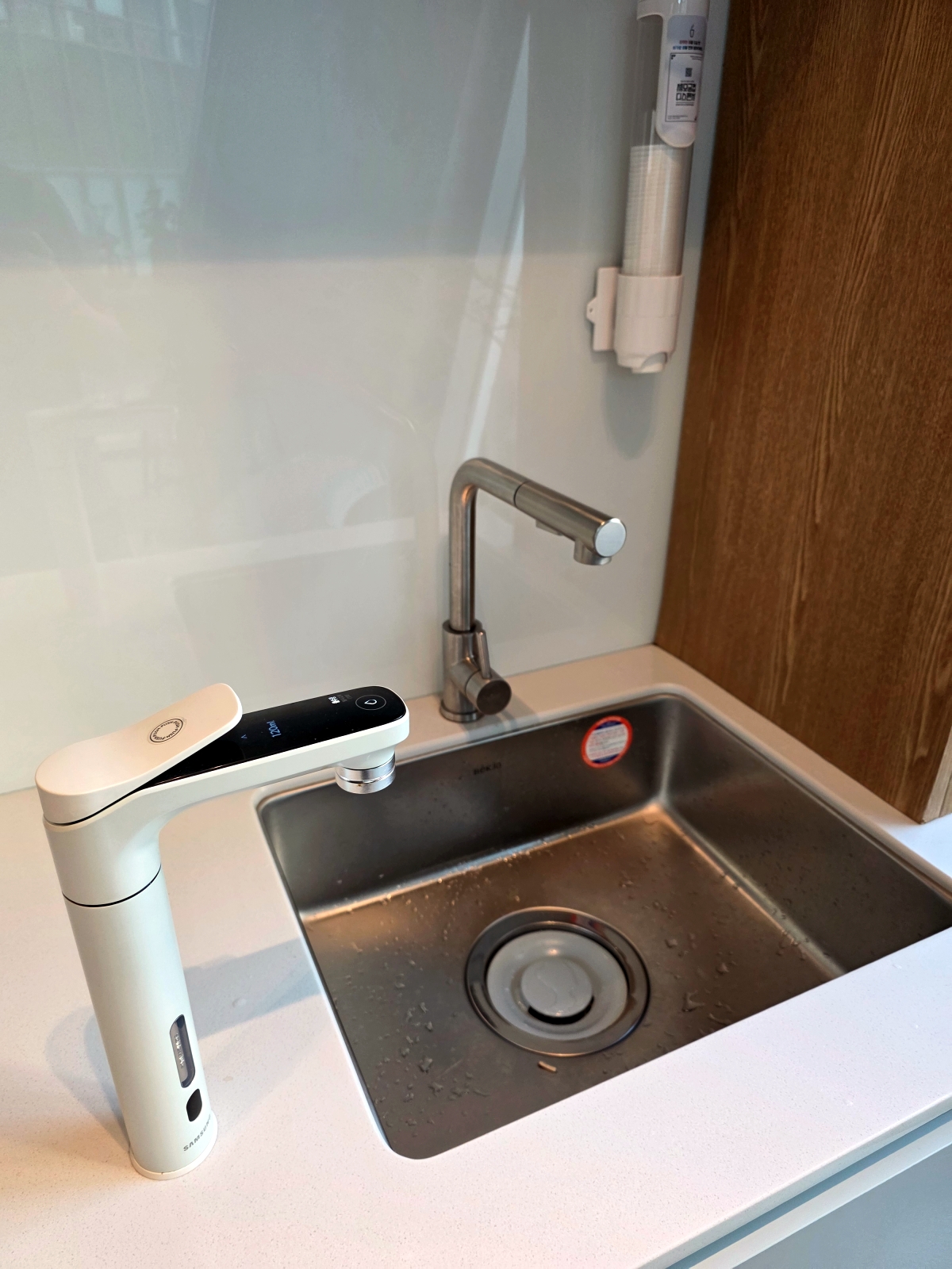 water sink station at capsule hotel lounge