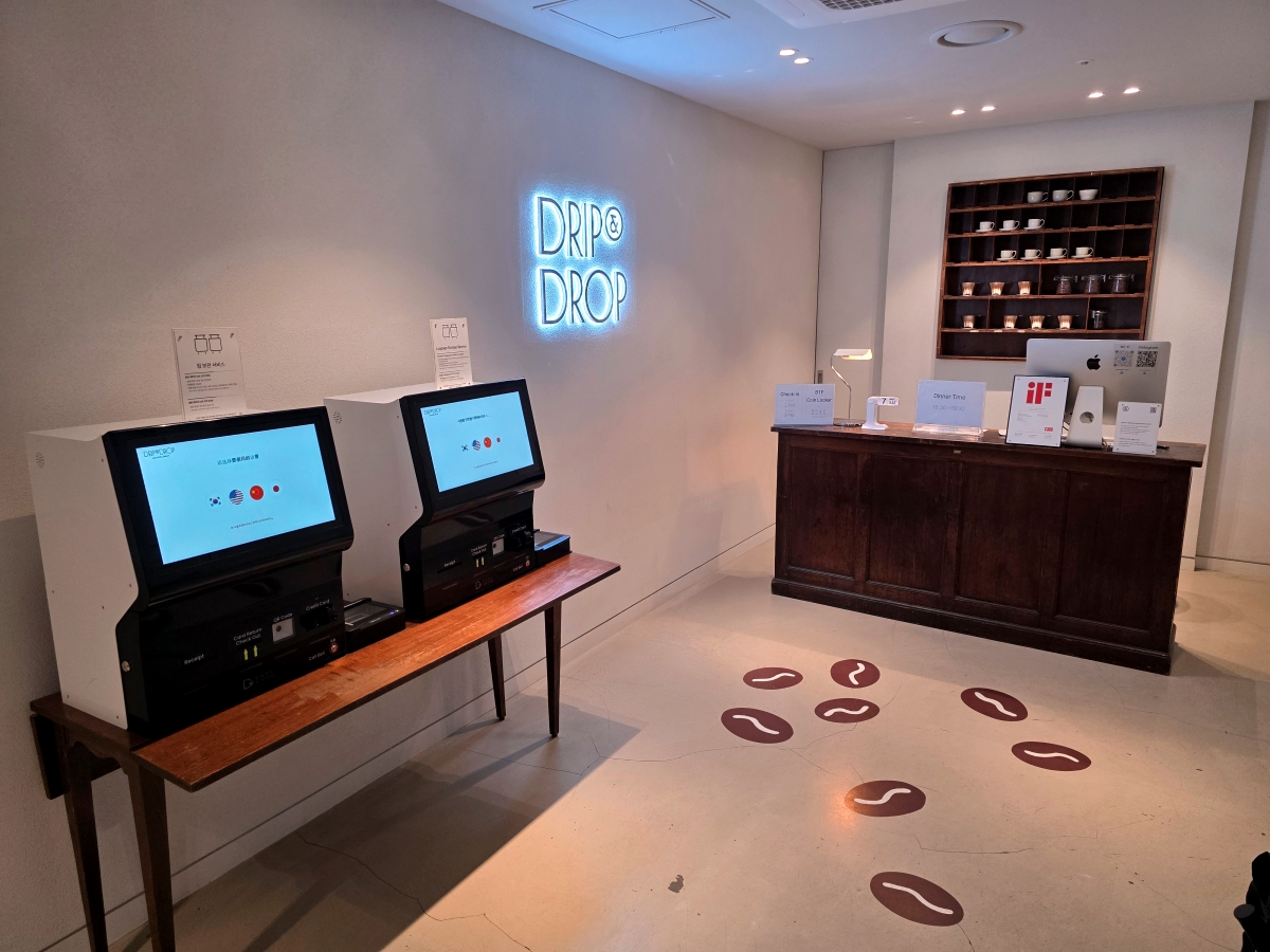 self check-in kiosk at drip drop myeongdong capsule hotel