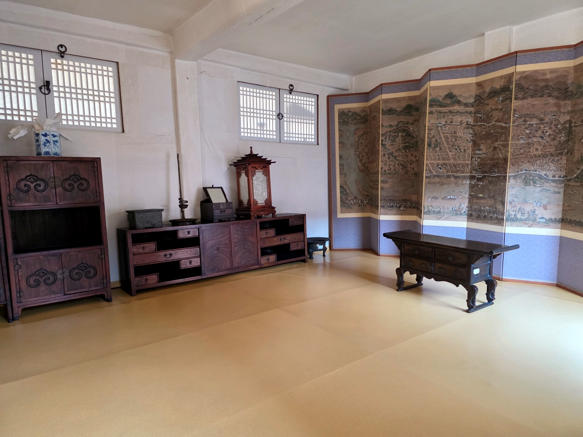 Traditional Korean wooden furniture inside a Hanok room