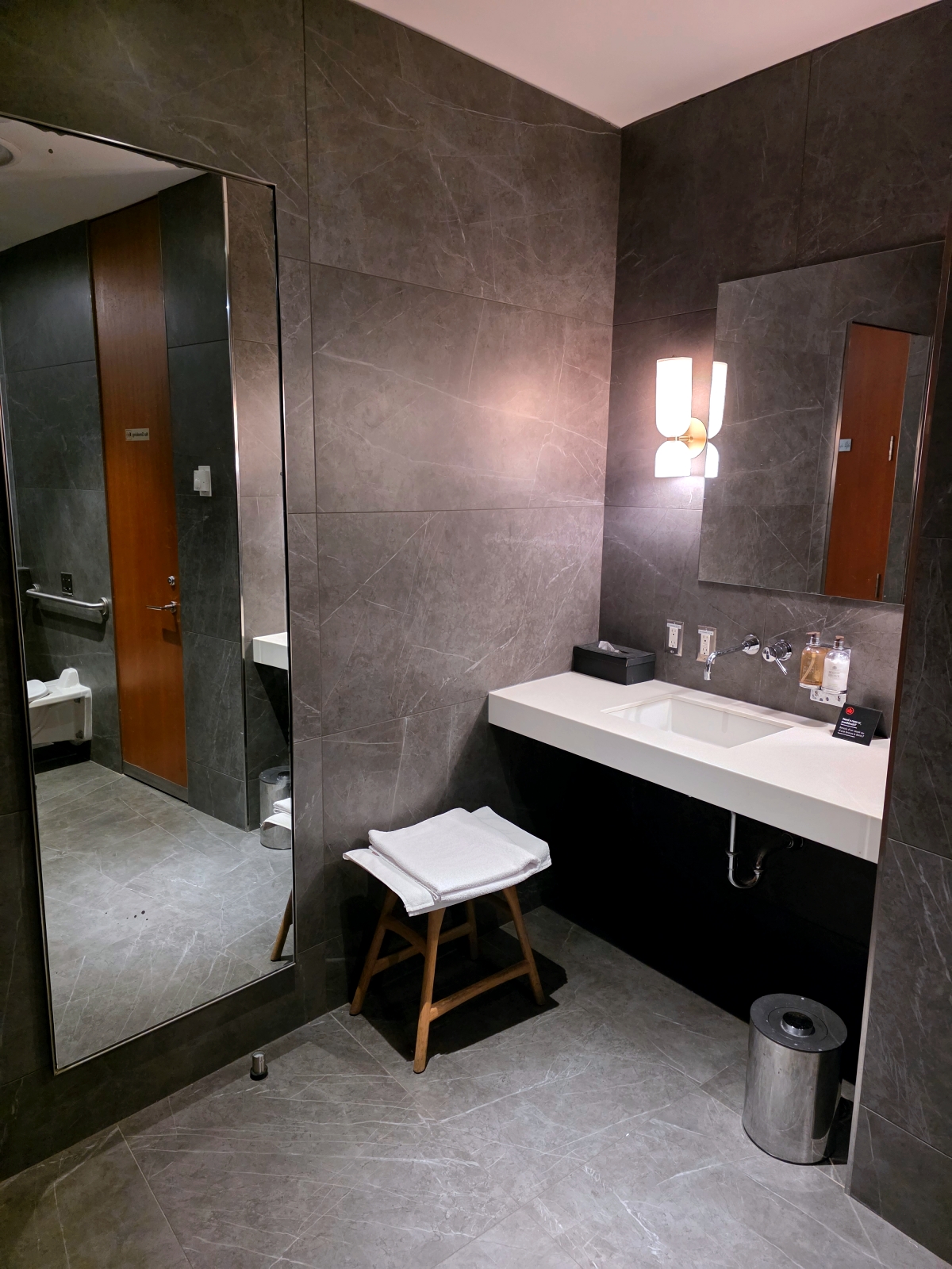 Sink and vanity area inside the Maple Leaf Lounge shower room at Toronto Airport