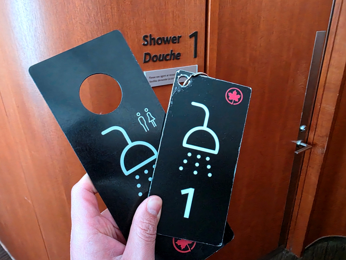 Shower room key tag provided at the Maple Leaf Lounge at Toronto Airport