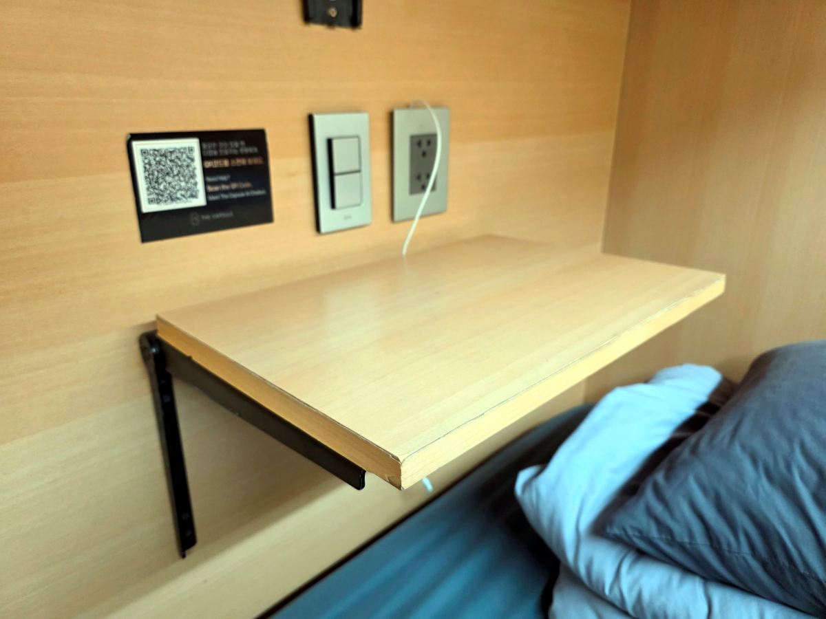 small desk inside capsule