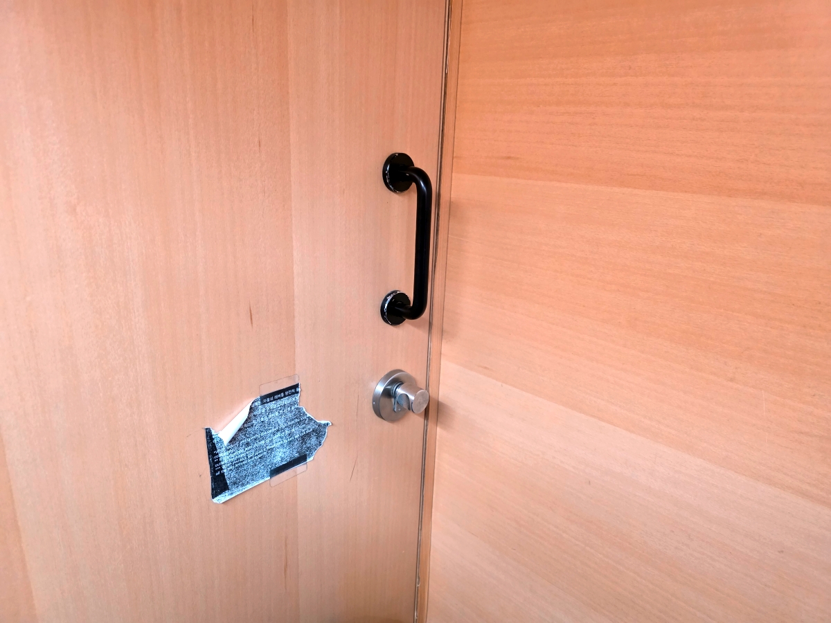 capsule door lock detail at THE CAPSULE Myeongdong