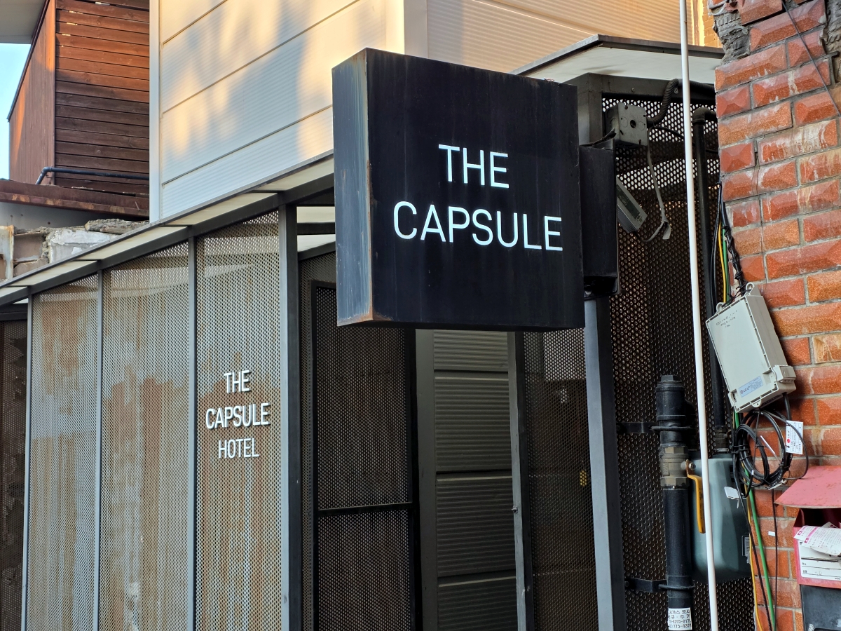 THE CAPSULE Myeongdong exterior sign in Seoul
