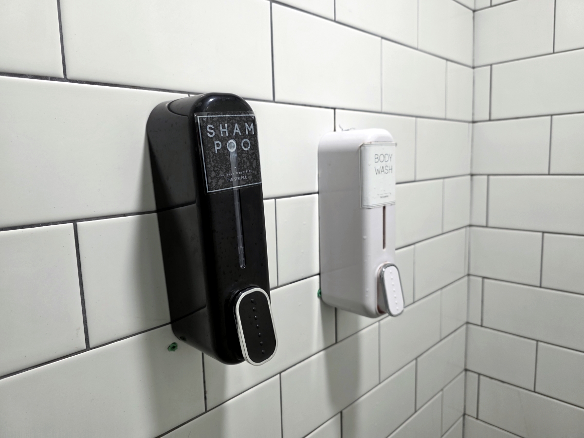 shampoo and body wash in shower