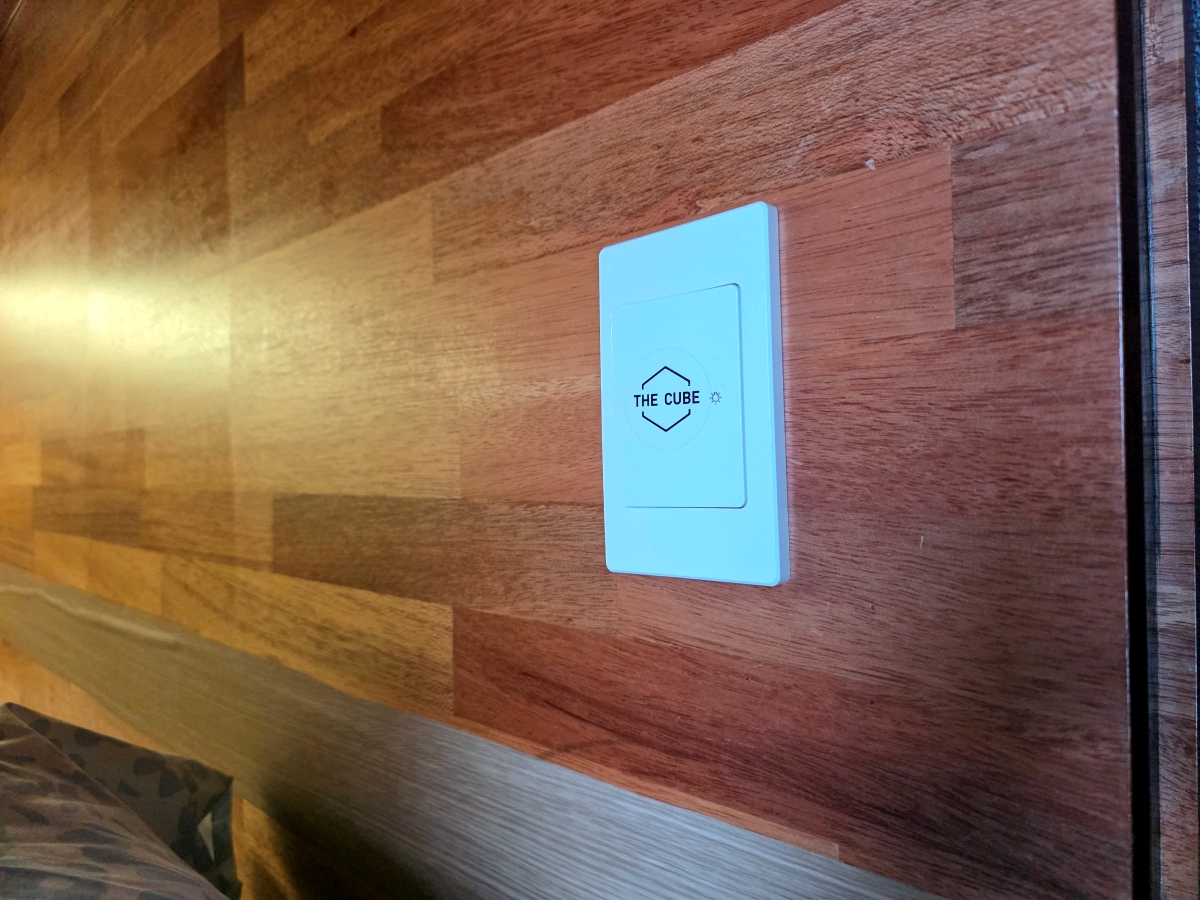 Light switch at capsule entrance at The Cube Hotel Myeongdong
