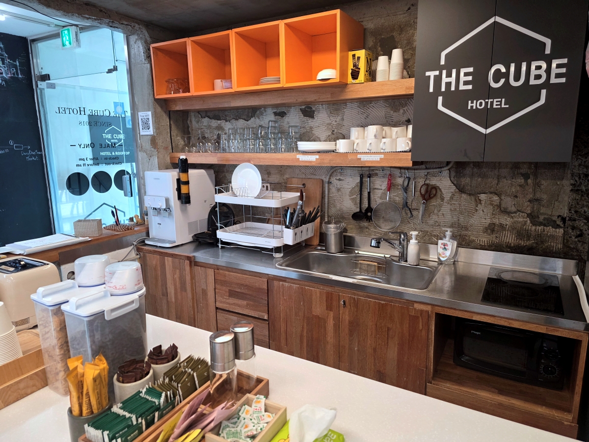 Common dining area with kitchen at The Cube Hotel Myeongdong