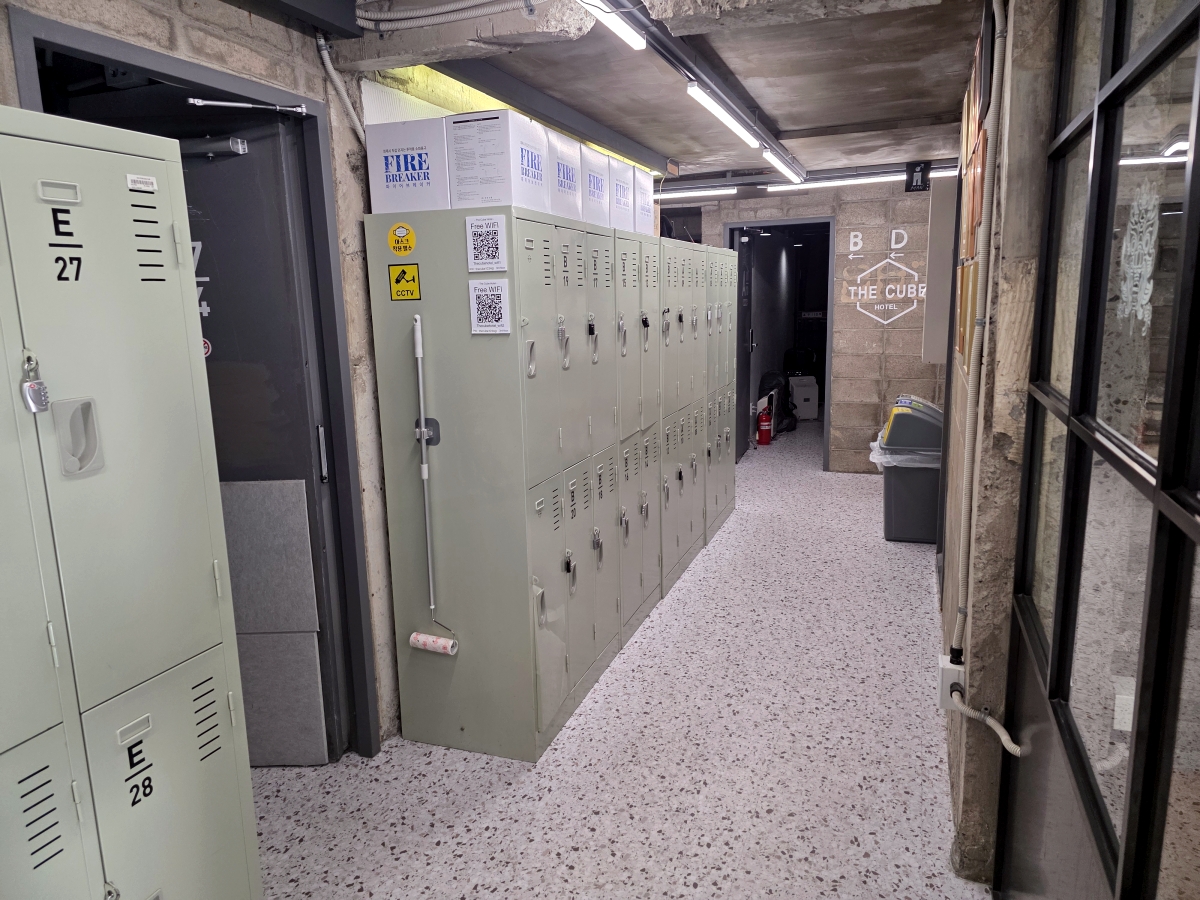 Small lockers in hallway at The Cube Hotel Myeongdong