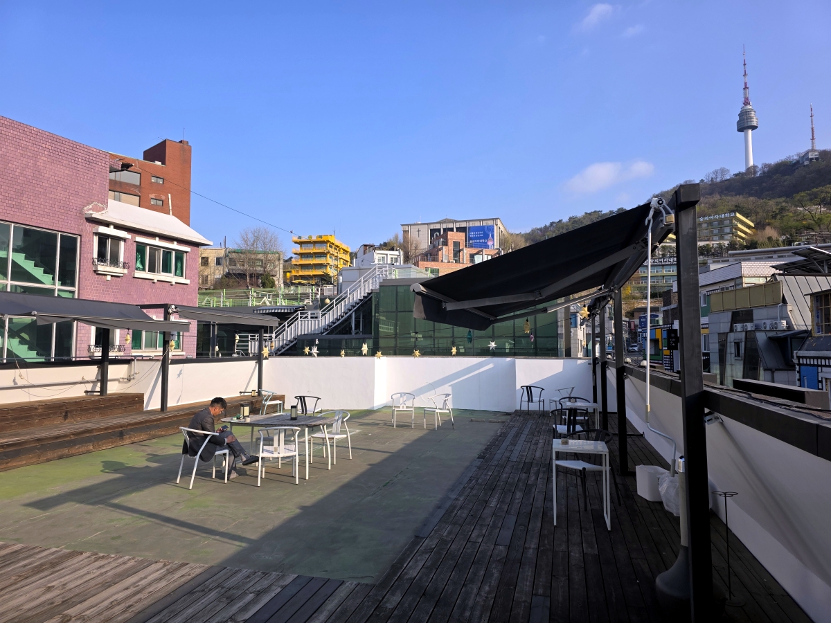 Rooftop terrace with table at The Cube Hotel Myeongdong